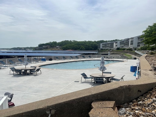 5450 Christopher Ln Unit 415, Osage Beach, MO 65065 - community pool featuring a patio