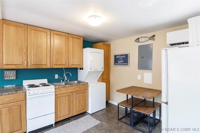 kitchen with electric panel, white appliances, a wall unit AC, sink, and stacked washer and dryer