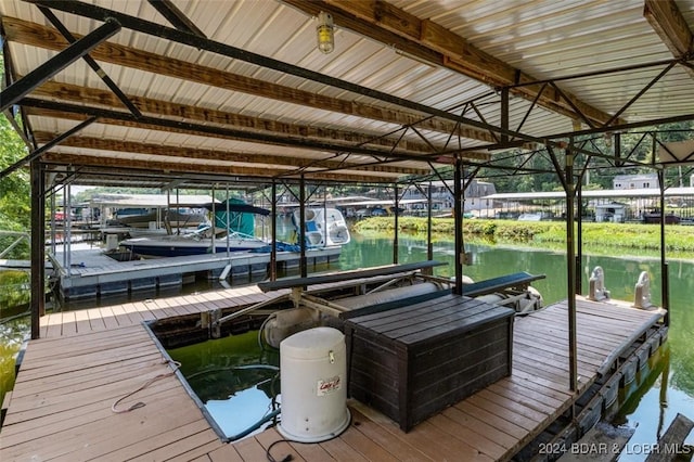 dock area featuring a water view