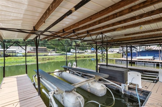 dock area featuring a water view