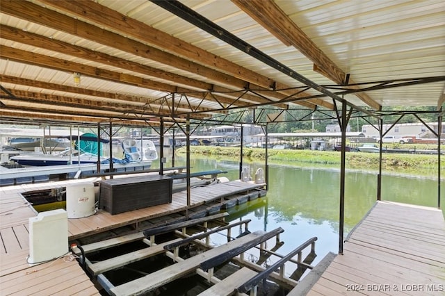 view of dock with a water view