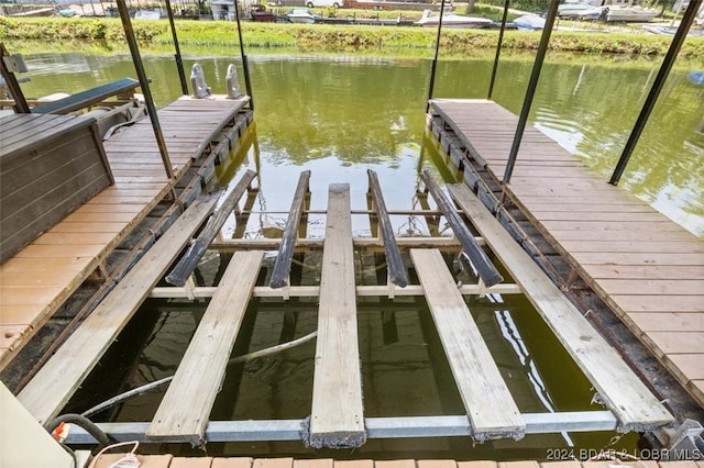 view of dock with a water view