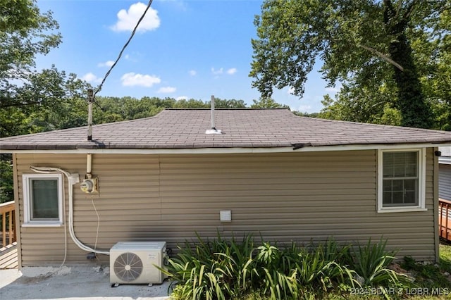 view of home's exterior featuring ac unit