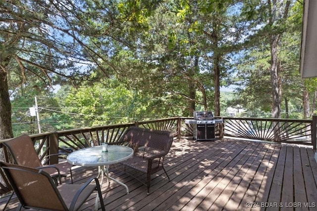 wooden deck featuring grilling area