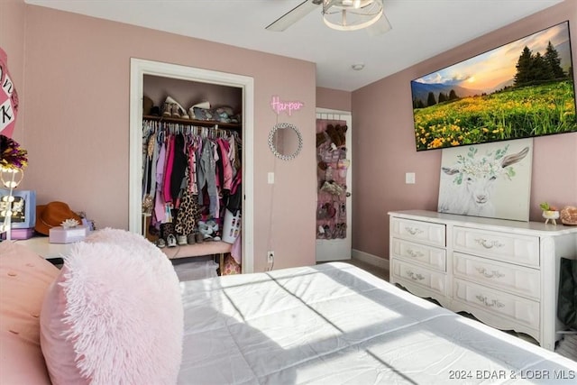 bedroom with ceiling fan and a closet