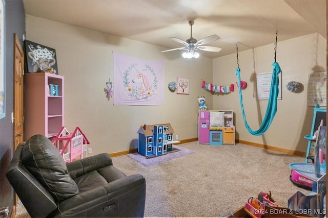 playroom featuring carpet flooring and ceiling fan