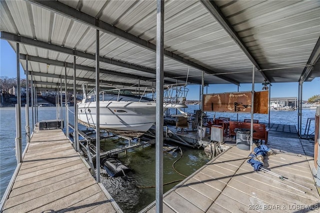 dock area featuring a water view