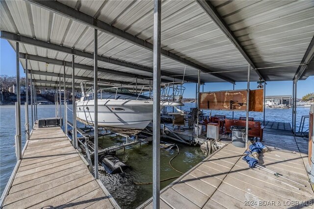 view of dock with a water view