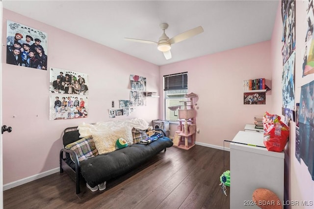 interior space featuring ceiling fan and dark wood-type flooring