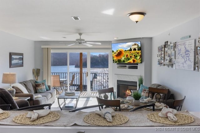 living room featuring ceiling fan