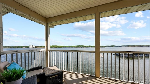 balcony featuring a water view