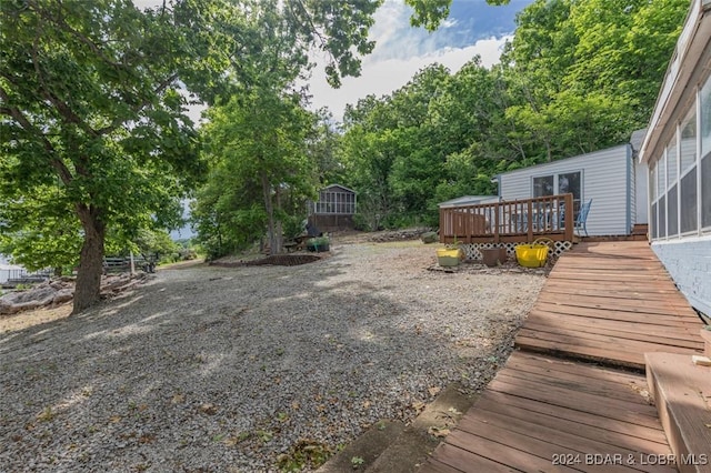 view of yard with a deck