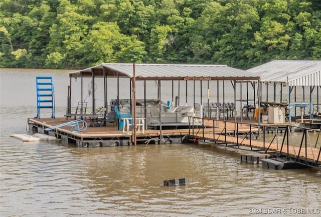 view of dock with a water view