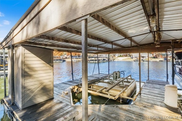 dock area featuring a water view