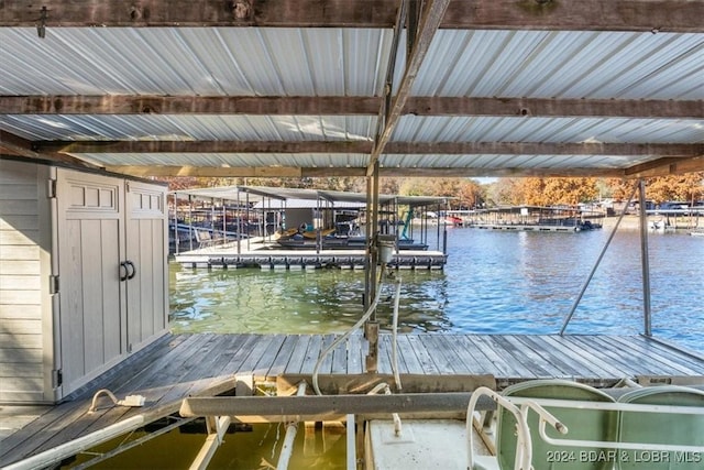 view of dock with a water view