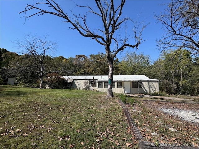 exterior space with a lawn