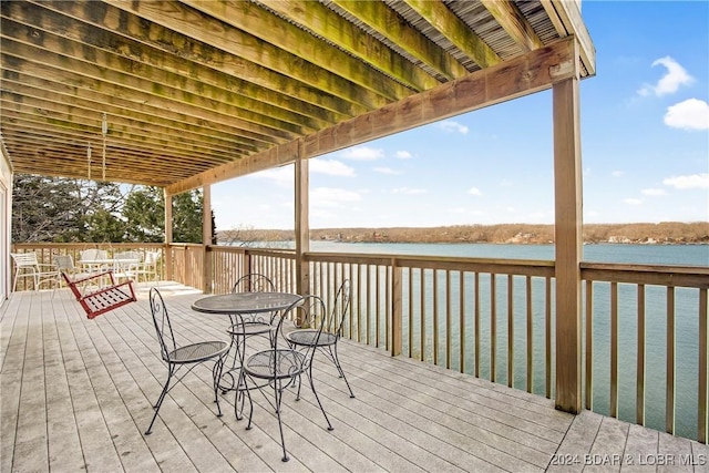 wooden terrace with a water view