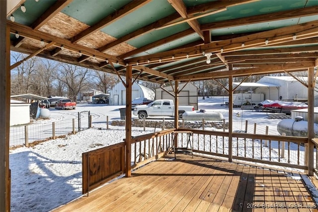 view of snow covered deck