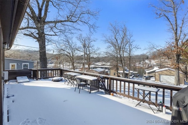 view of snow covered deck