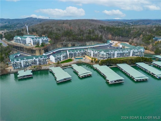 birds eye view of property featuring a water view