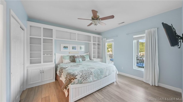 bedroom featuring ceiling fan and light wood-type flooring