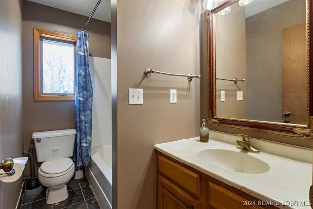 full bathroom featuring tile patterned flooring, vanity, toilet, and shower / bathtub combination with curtain