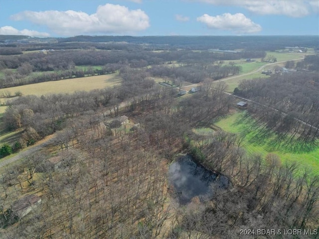 aerial view with a water view and a rural view