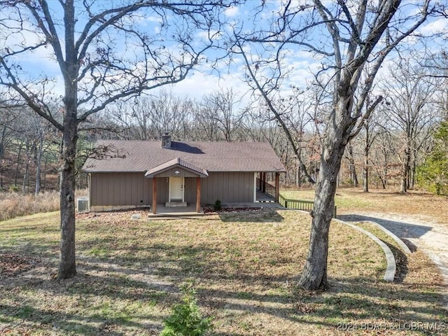 ranch-style house with a front lawn