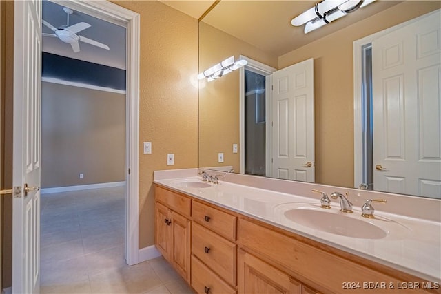 bathroom with tile patterned floors, ceiling fan, and vanity