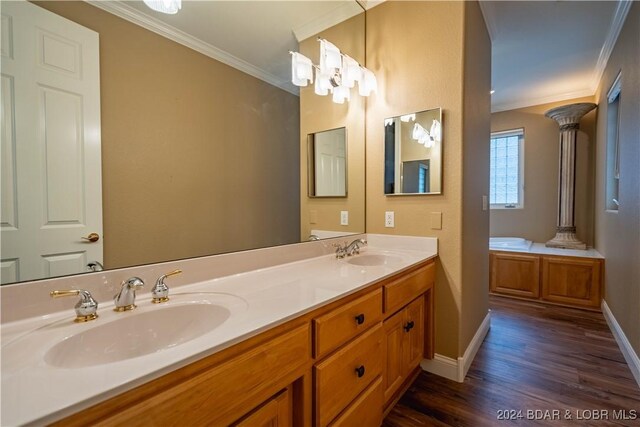 825 Grand View Dr, Porto Cima, MO 65079 - full bathroom featuring ornamental molding, double vanity, wood finished floors, and ornate columns