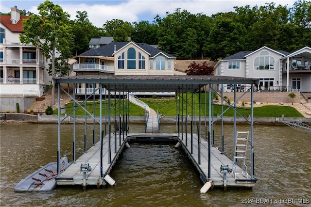 dock area with a water view