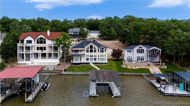 exterior space with a water view