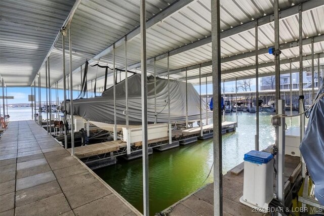 view of dock with a water view