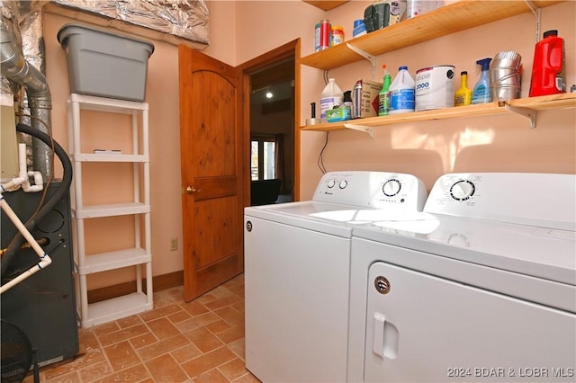 26 Gap Rd, Tunas, MO 65764 - laundry area featuring washing machine and dryer and brick patterned flooring