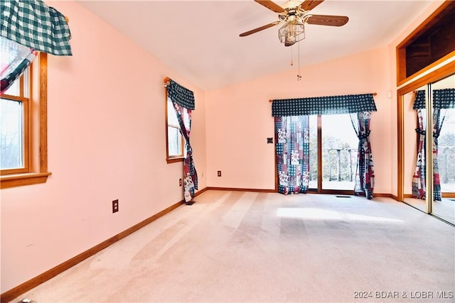 26 Gap Rd, Tunas, MO 65764 - carpeted spare room with baseboards, a ceiling fan, and vaulted ceiling