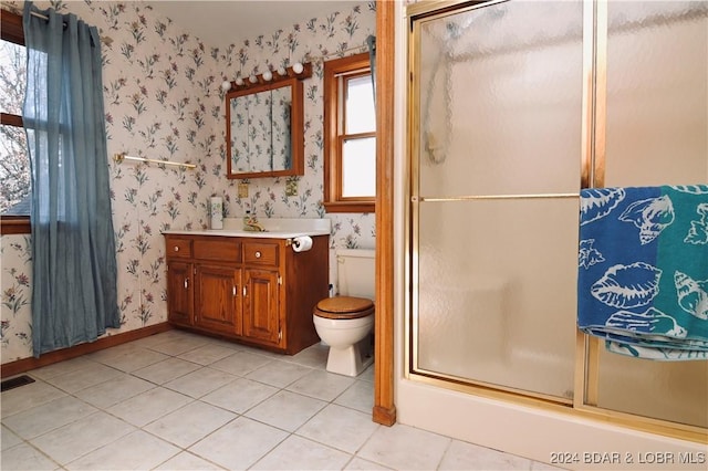 26 Gap Rd, Tunas, MO 65764 - full bathroom featuring wallpapered walls, a shower with shower door, tile patterned floors, vanity, and toilet