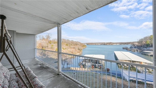 balcony featuring a water view