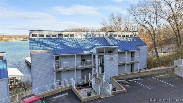 view of building exterior featuring a water view