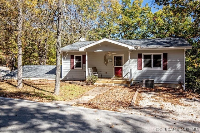 view of front of home with central AC unit and covered porch