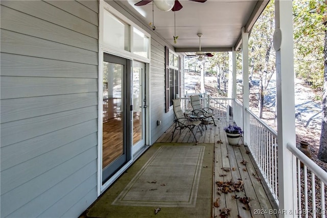 exterior space featuring ceiling fan