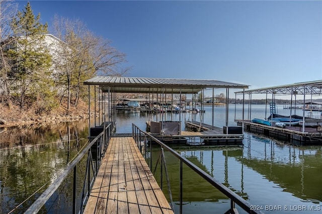 dock area featuring a water view