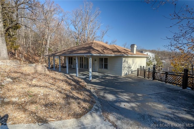 view of front of house with a patio area