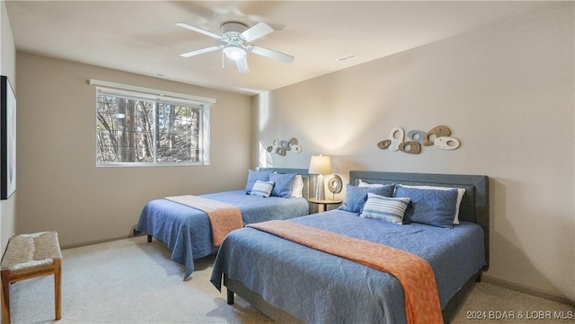 bedroom featuring carpet and ceiling fan