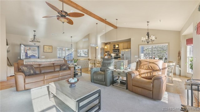 living room with beamed ceiling, light carpet, ceiling fan with notable chandelier, and a healthy amount of sunlight