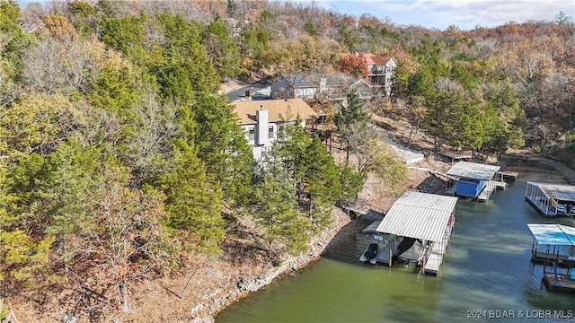 drone / aerial view with a water view