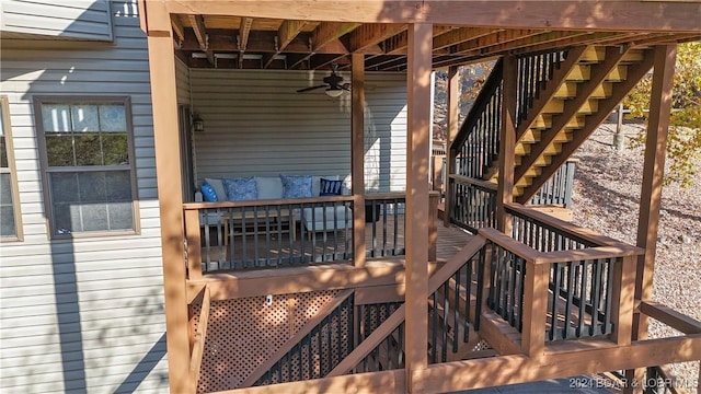 wooden terrace featuring ceiling fan