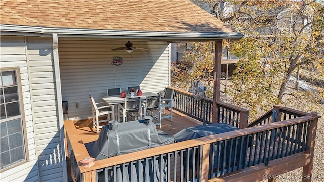 wooden terrace featuring ceiling fan