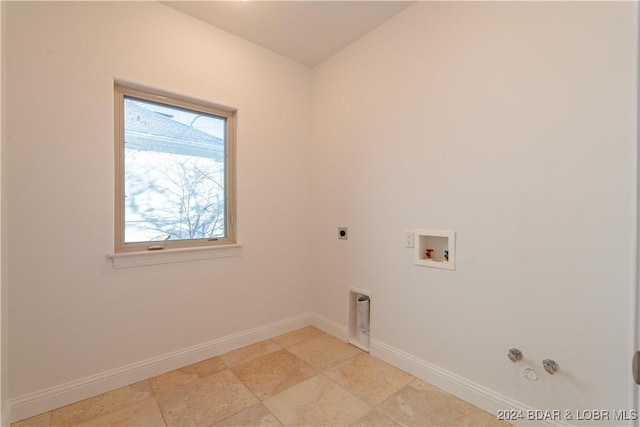 laundry area featuring electric dryer hookup, hookup for a gas dryer, and hookup for a washing machine