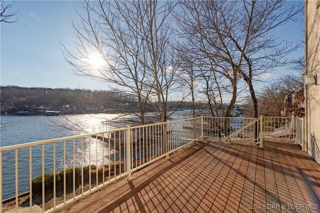 550 Grand Cove Rd, Porto Cima, MO 65079 - wooden terrace with a water view