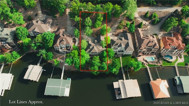 550 Grand Cove Rd, Porto Cima, MO 65079 - aerial view of residential area with property boundaries highlighted and a large body of water